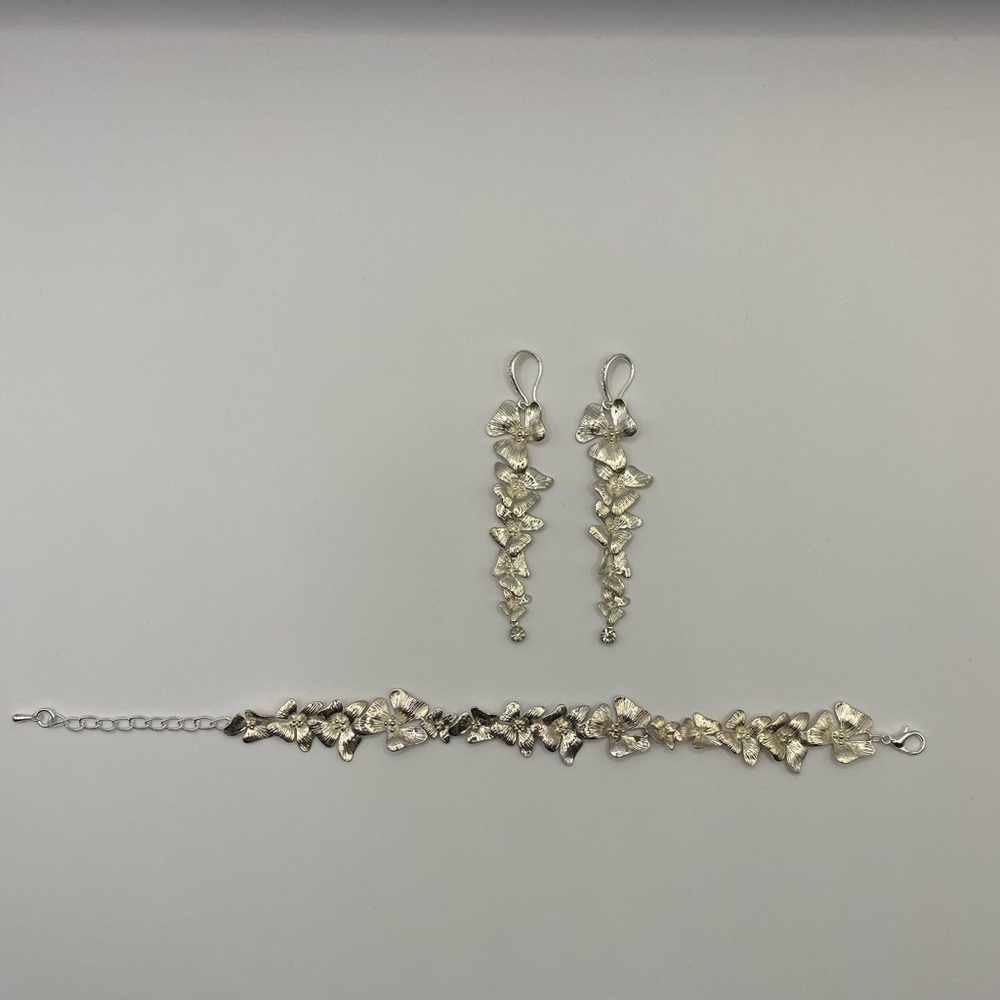 Handmade earrings and bracelet set. Made by me. New! Never worn!